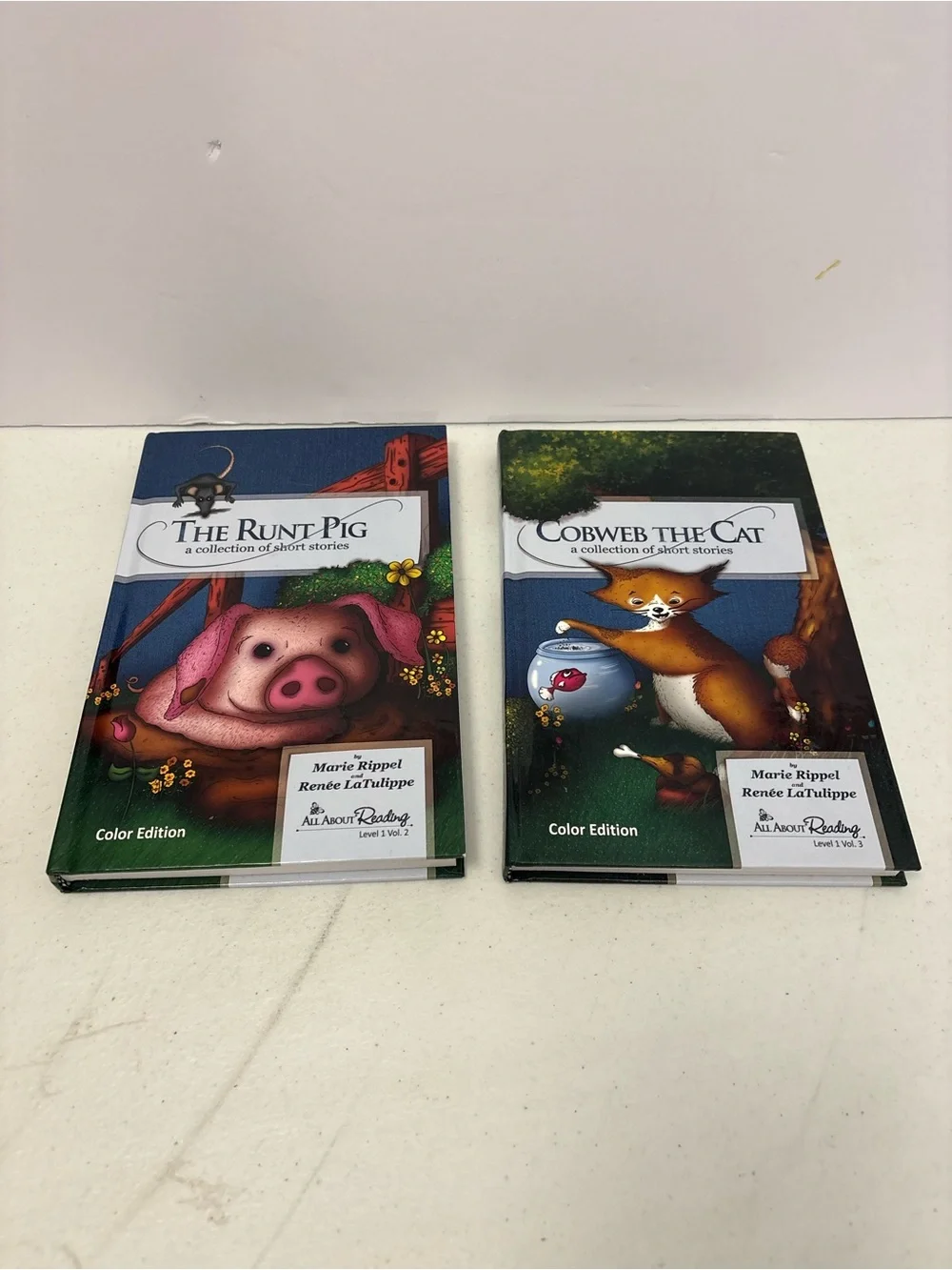 The Runt Pig & Cobweb Cat by Marie Rippel All About Reading Level 1 Vol. 2 & 3